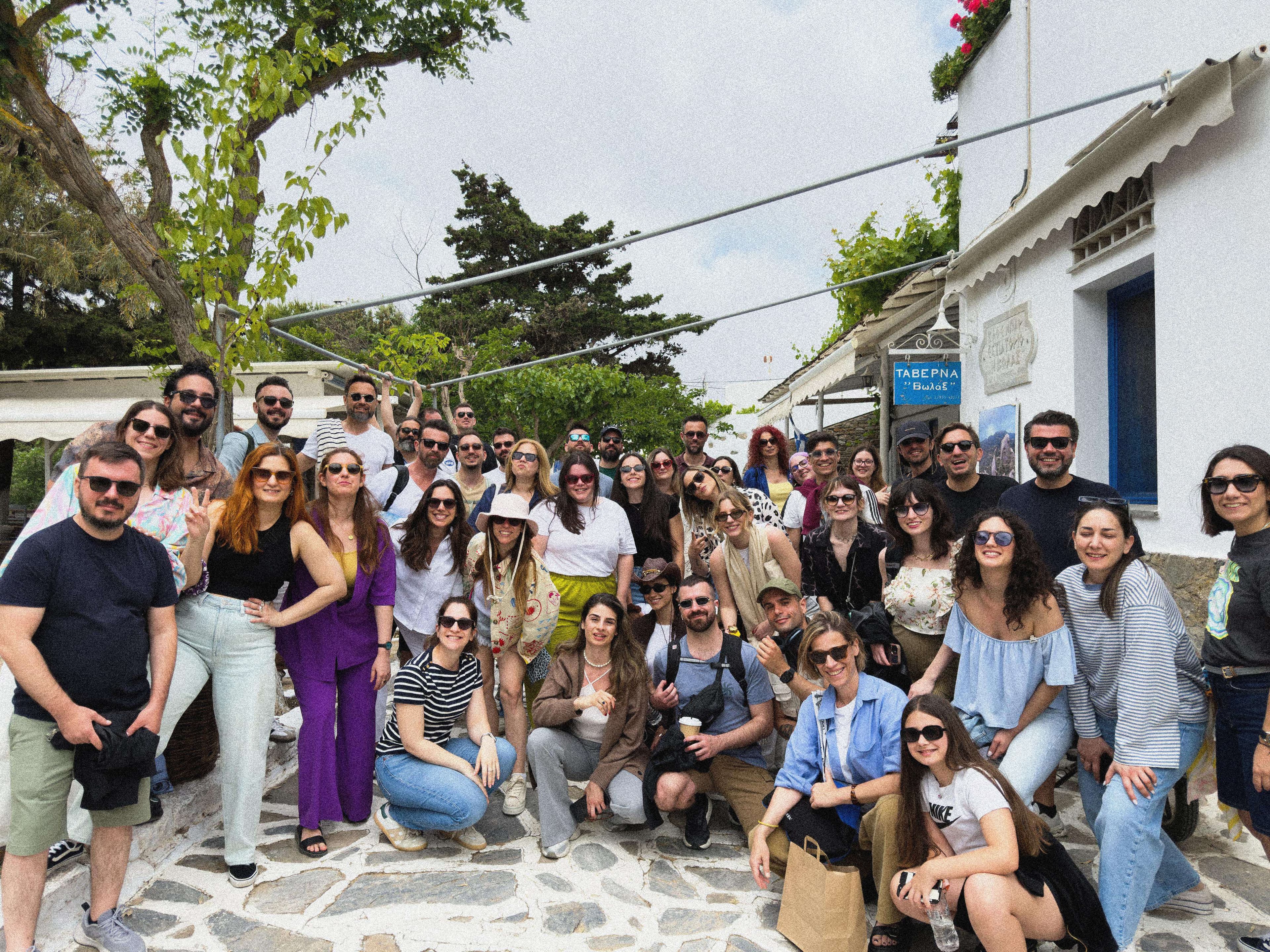 The full REBORRN team gathered outside a taverna on a Greek island retreat
